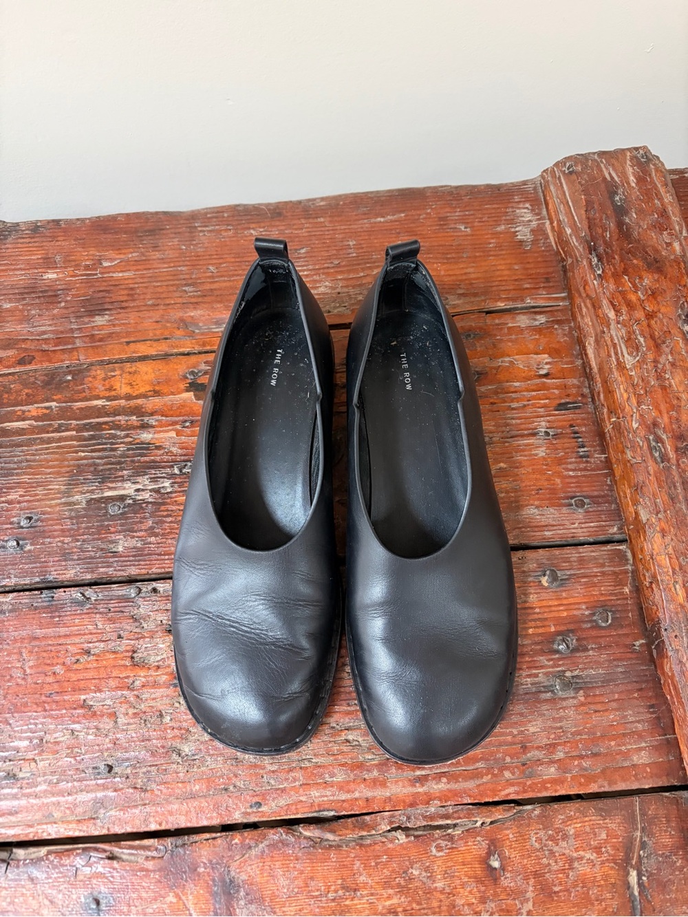 The Row Black Leather Rounded-Toe Slip-On Flats